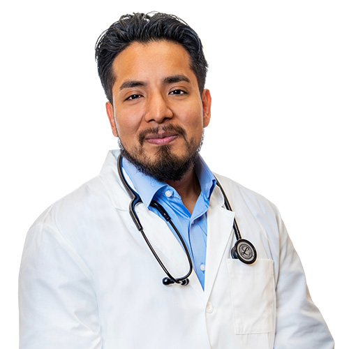 A headshot of Juan Maldonado, PA-C. He is wearing a blue dress shirt with a white coat and has a stethoscope around his neck.