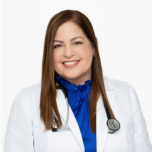 A headshot of Dr. Wyned Morales, M.D., wearing a white lab coat and a blue shirt with a stethoscope hanging around her neck.